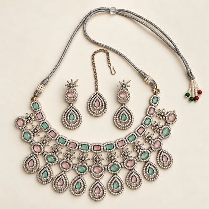 P03 mint and pink necklace, maang tikka and both earrings on ivory