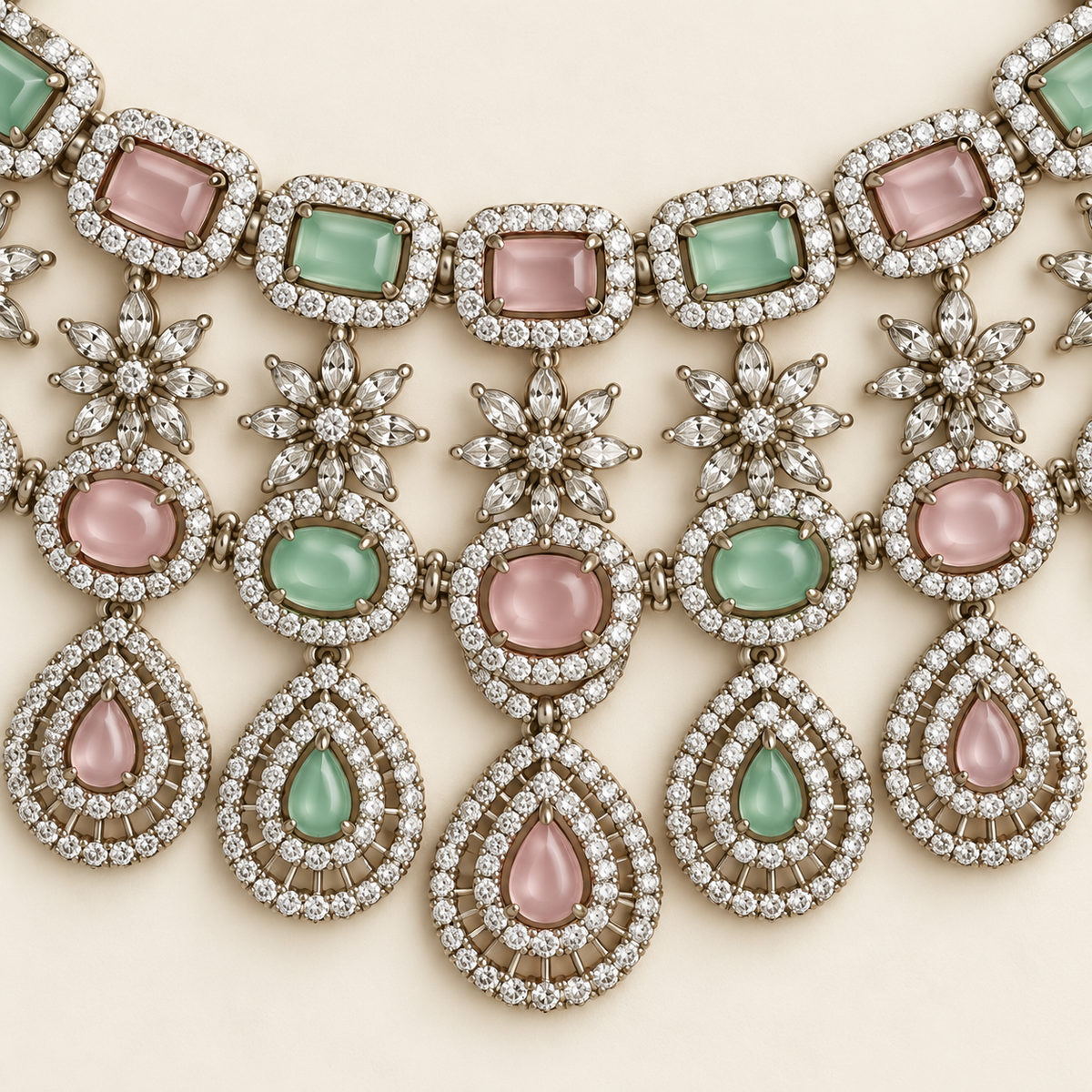 P03 necklace close-up showing mint and pink settings, floral links and open teardrops
